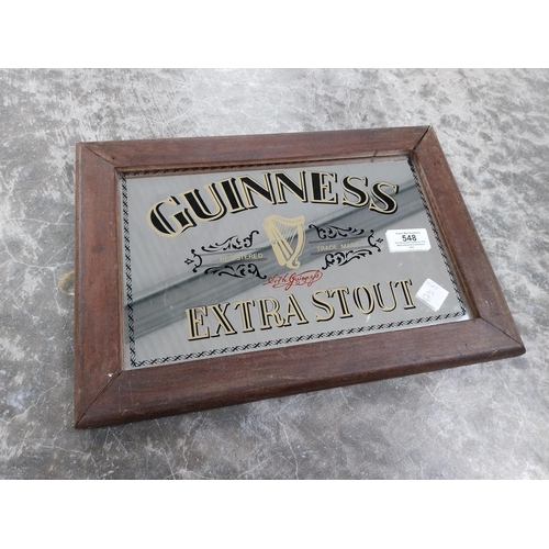 548 - Framed Guinness Extra Stout advertising mirror. {24 cm H x 35 cm W}.