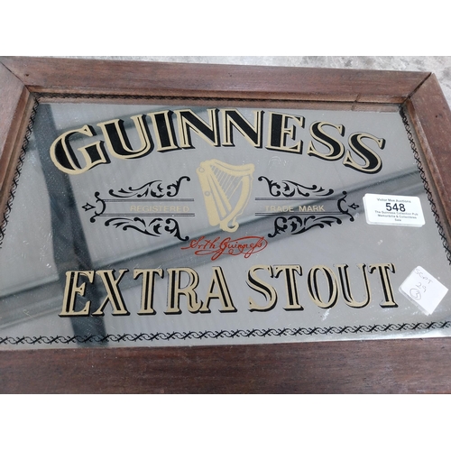 548 - Framed Guinness Extra Stout advertising mirror. {24 cm H x 35 cm W}.