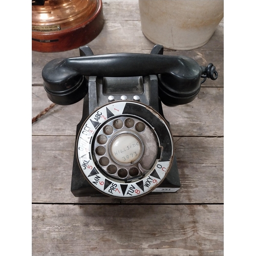 551 - 1940's Bakelite telephone. {15 cm H x 15 cm W x 20 cm D}.