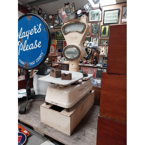 578 - 1930's enamel and brass Henry Pooley and Son Birmingham shop scales. {98 cm H x 28 cm W x 58 cm D}.