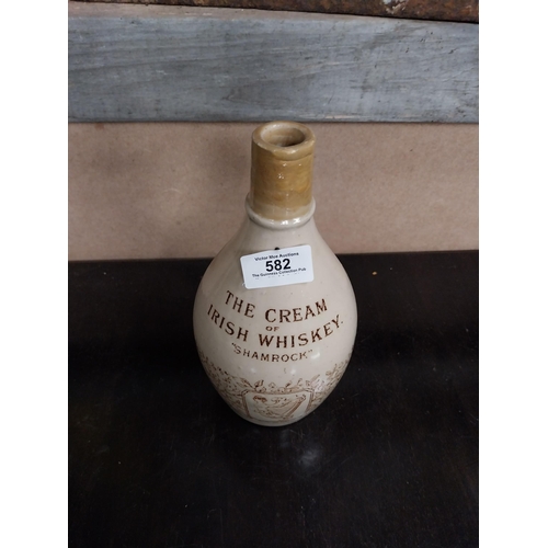 582 - Shamrock Cream Irish Whiskey stoneware flagon. {32cm H x 11 cm Dia.}.