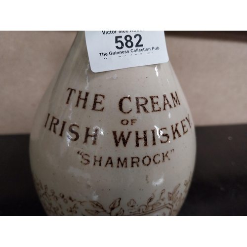 582 - Shamrock Cream Irish Whiskey stoneware flagon. {32cm H x 11 cm Dia.}.