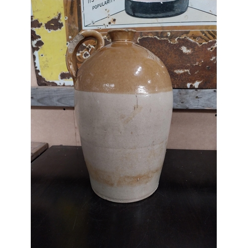 589 - L Egan North King Street Dublin Two gallon stoneware whiskey flagon. {49 cm H x 32 cm Dia.}.