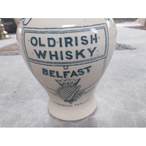 597 - O'Donnell's Old Irish Whisky Belfast advertising stoneware flagon {20 cm H x 13 cm W x 13 cm D}.