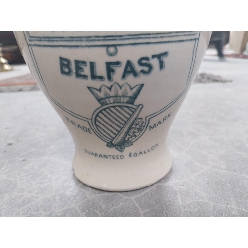 597 - O'Donnell's Old Irish Whisky Belfast advertising stoneware flagon {20 cm H x 13 cm W x 13 cm D}.