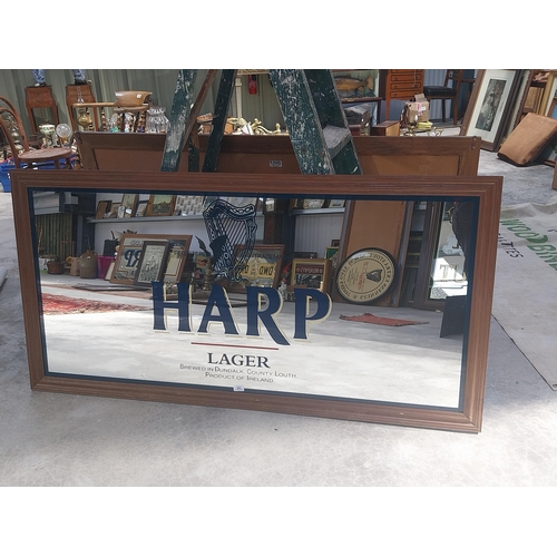 603 - 20th C. Harp Lager brewed in Dundalk, Co. Louth framed advertising mirror {82 cm H x 163 cm W}.