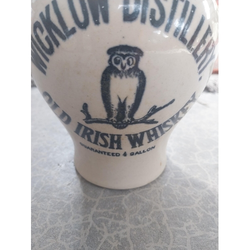 609 - Wicklow Distillery Old Irish Whiskey advertising stoneware flagon {19 cm H x 12 cm W x 13 cm D}.