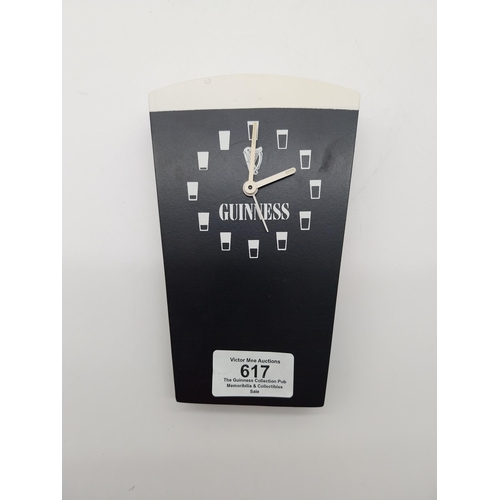 617 - Two Guinness advertising clocks {23 cm H x 9 cm W to 8 cm H x  4 cm D}. PART OF THE DAVID HUGHES COL... 