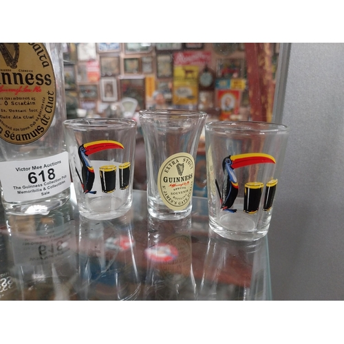 618 - Four Guinness shot glasses and Guinness glass in box. PART OF THE DAVID HUGHES COLLECTION.