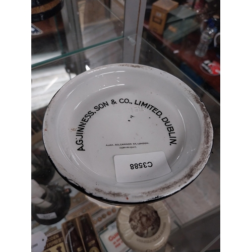 623 - Guinness ceramic ashtray in form of barrel top. {4 cm H x 12 cm Dia.}. PART OF THE DAVID HUGHES COLL... 