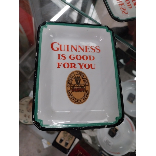 629 - Two Guinness is Good for You Mintons 1932 ashtrays {13 cm H x 10 cm W}. PART OF THE DAVID HUGHES COL... 