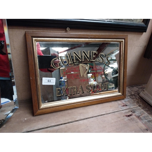 63 - Framed 1970's Guinness Extra Stout advertising mirror. {24 cm H x 34 cm W}.