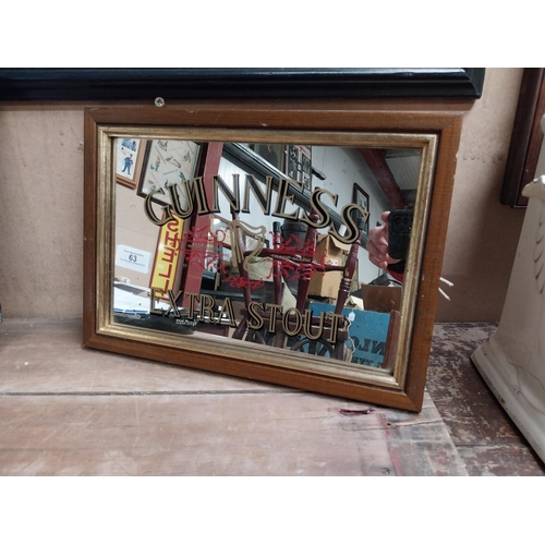 63 - Framed 1970's Guinness Extra Stout advertising mirror. {24 cm H x 34 cm W}.