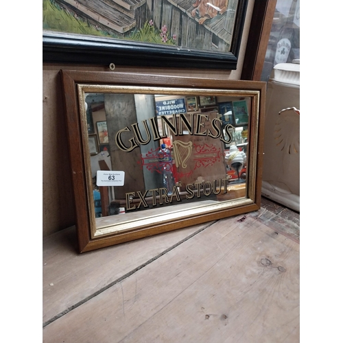 63 - Framed 1970's Guinness Extra Stout advertising mirror. {24 cm H x 34 cm W}.