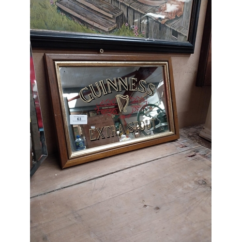 63 - Framed 1970's Guinness Extra Stout advertising mirror. {24 cm H x 34 cm W}.