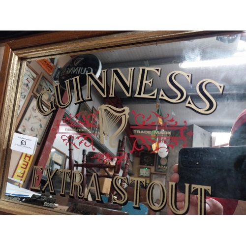 63 - Framed 1970's Guinness Extra Stout advertising mirror. {24 cm H x 34 cm W}.