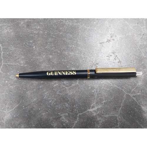 631 - Three Guinness Pens including Gold Cross Guinness Park Royal 1936-1986 and Guinness Pencil. {14 cm L... 