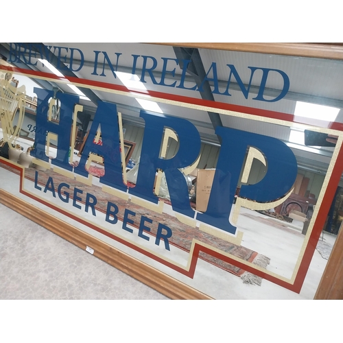 651 - 20th C. Brewed in Ireland Harp Lager Beer framed advertising mirror {86 cm H x 167 cm W}.