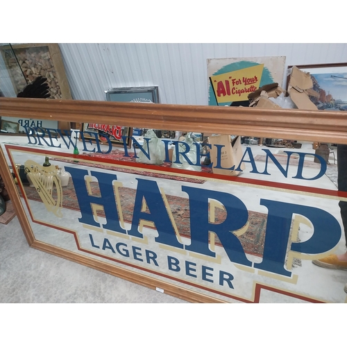 651 - 20th C. Brewed in Ireland Harp Lager Beer framed advertising mirror {86 cm H x 167 cm W}.