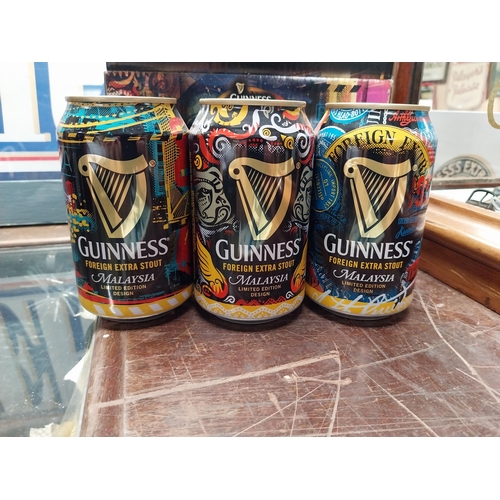 680 - Special set of Three Guinness Malaysian cans {14 cm H x 27 cm W}. PART OF THE DAVID HUGHES COLLECTIO... 