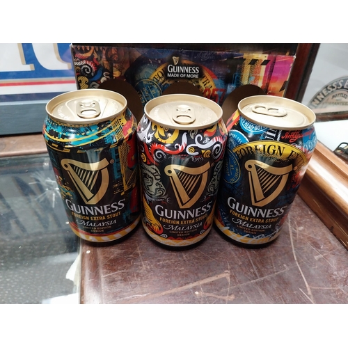 680 - Special set of Three Guinness Malaysian cans {14 cm H x 27 cm W}. PART OF THE DAVID HUGHES COLLECTIO... 