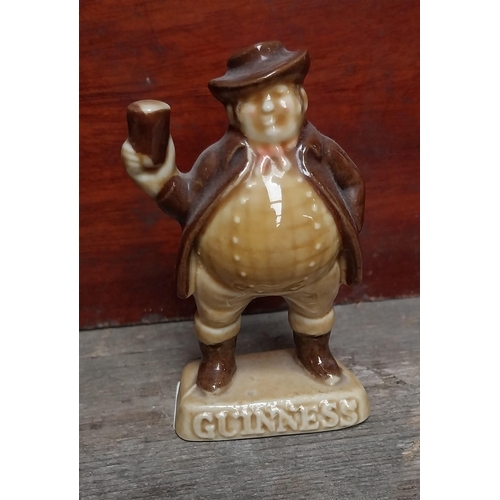 685 - Set of four Wade Pottery Guinness figures - Wellington, Sam Weller, Mad Hatter and Tweedledum/Tweedl... 