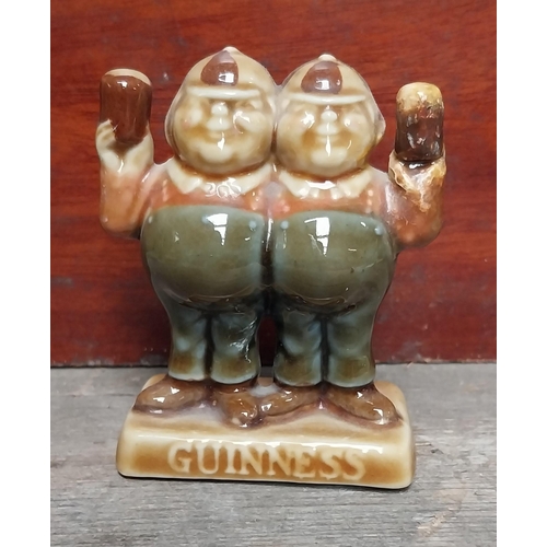 685 - Set of four Wade Pottery Guinness figures - Wellington, Sam Weller, Mad Hatter and Tweedledum/Tweedl... 