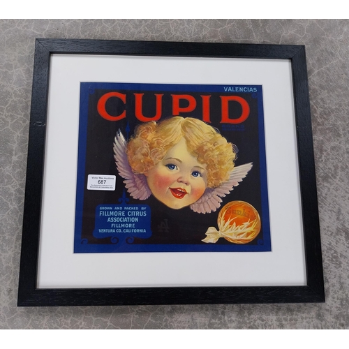 687 - Cupid Sunkist framed advertising print. {28 cm H x 40 cm W}.