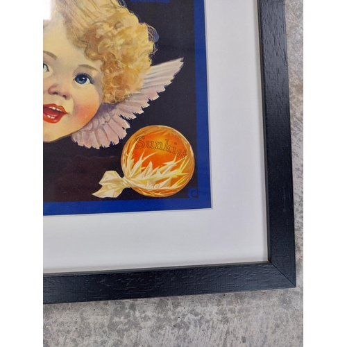 687 - Cupid Sunkist framed advertising print. {28 cm H x 40 cm W}.