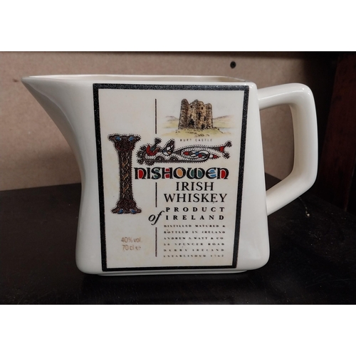 690 - Ritz ceramic water Jug, Inishowen Irish Whiskey and Guinness Essen 1996 advertising jugs {16 cm H x ... 