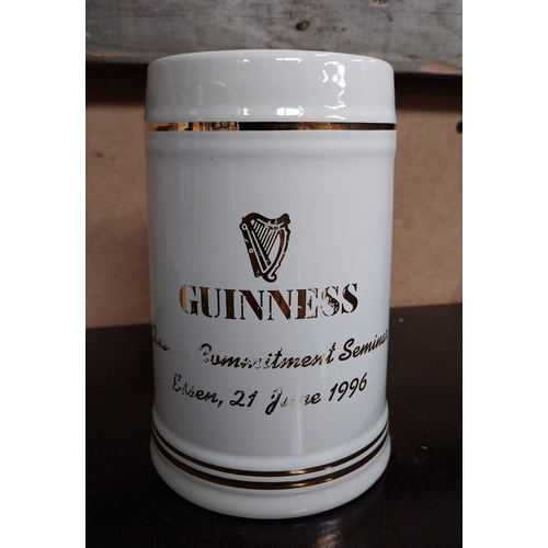 690 - Ritz ceramic water Jug, Inishowen Irish Whiskey and Guinness Essen 1996 advertising jugs {16 cm H x ... 