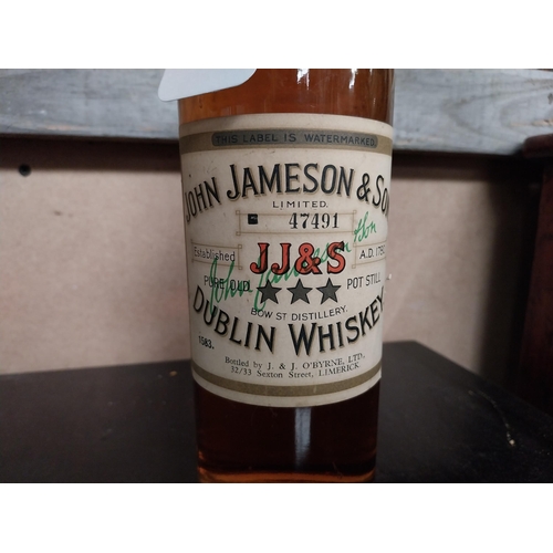 694 - Bottle of John Jameson Irish Whiskey.