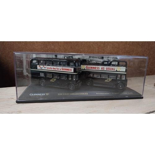 731 - Acrylic boxed Diecast Guinness buses Shamrock Gift Co Dublin, Two vehicles per box {8 cm H x 22 cm W... 