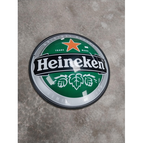 743 - Heineken Perspex half advertising sign. {76 cm Dia.}.