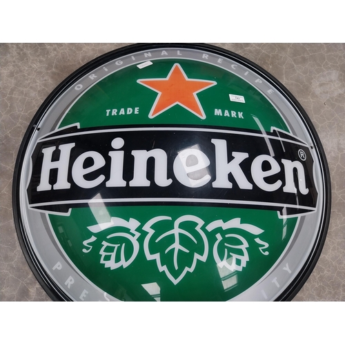 743 - Heineken Perspex half advertising sign. {76 cm Dia.}.