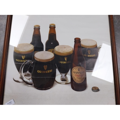 745 - Framed 1970's Holidaymakers Guinness advertising print - Riddle and Co. {80 cm H x 55 cm W}.