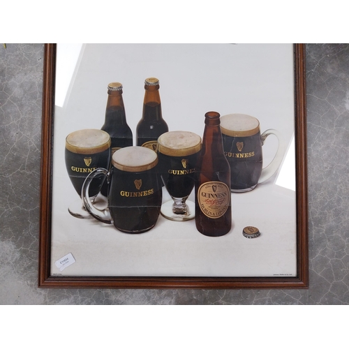 745 - Framed 1970's Holidaymakers Guinness advertising print - Riddle and Co. {80 cm H x 55 cm W}.