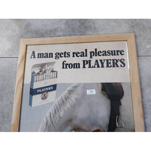 746 - Framed A Man Gets Real Pleasure From Player's advertising showcard. {82 cm H x 57 cm W}.