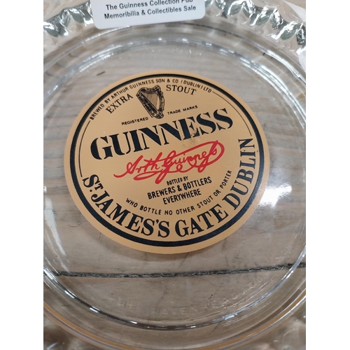 747 - Clear Glass Guinness ashtray with Guinness Dublin label. Ravenhead Glass {4 cm H x 15 cm Dia.}. PART... 