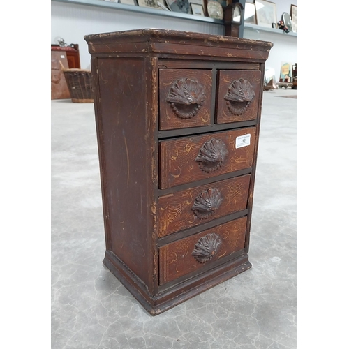 748 - 19th C. scumbled pine shop cabinet with two short drawers over three long drawers with carved wooden... 