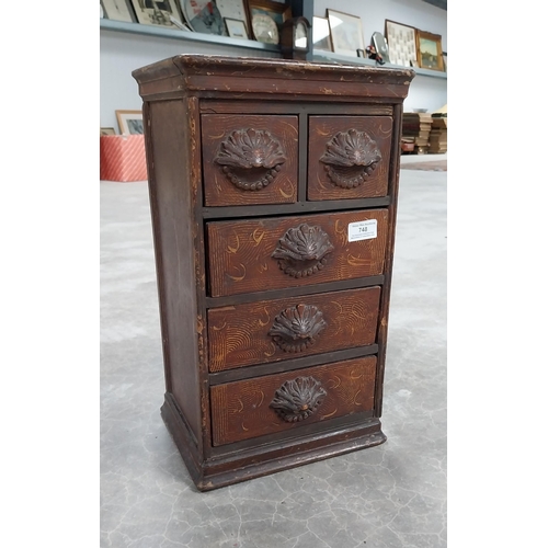 748 - 19th C. scumbled pine shop cabinet with two short drawers over three long drawers with carved wooden... 