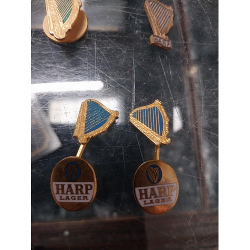 757 - Set of Harp Lager cufflinks and three Harp lapel badges. PART OF THE DAVID HUGHES COLLECTION.