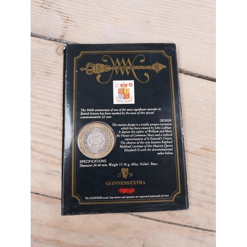 758 - 1989 Guinness �2 coin and Video 40 Years of Guinness. PART OF THE DAVID HUGHES COLLECTION.