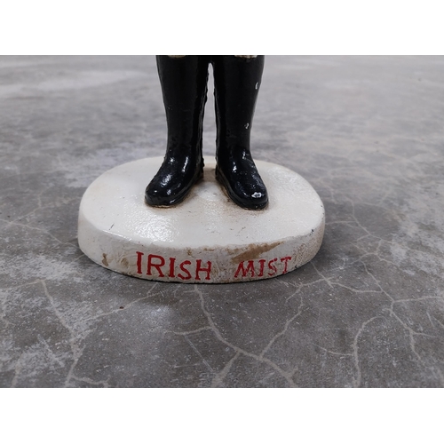 769 - Cast Iron Irish Mist advertising figure. {41 cm H x 13 cm Dia.}.