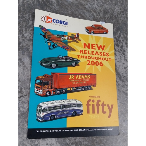 772 - 50th Anniversary Corgi model cars cardboard advertising showcard. {85 cm H x 60