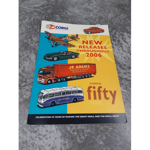 772 - 50th Anniversary Corgi model cars cardboard advertising showcard. {85 cm H x 60