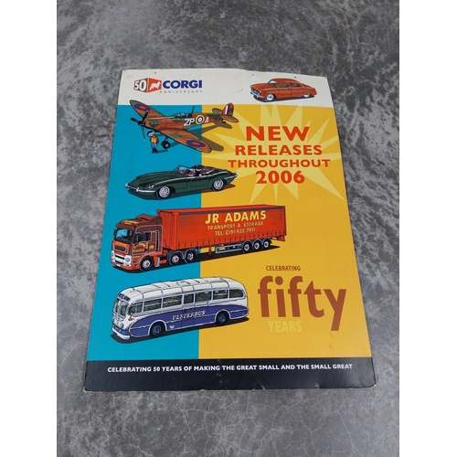 772 - 50th Anniversary Corgi model cars cardboard advertising showcard. {85 cm H x 60