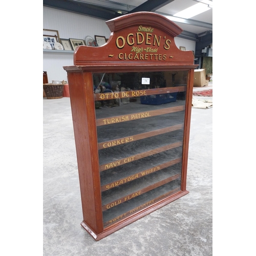 776 - Ogden's cigarettes dispensing advertising cabinet with seven pull out brand name drawers {H 77cm x W... 