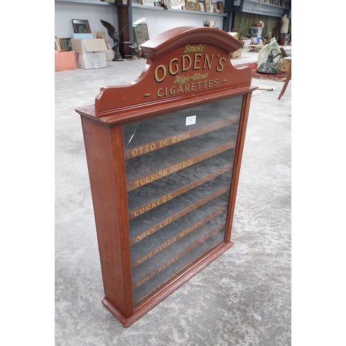 776 - Ogden's cigarettes dispensing advertising cabinet with seven pull out brand name drawers {H 77cm x W... 