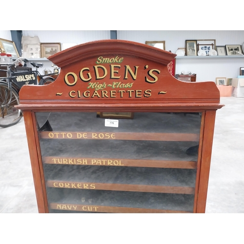 776 - Ogden's cigarettes dispensing advertising cabinet with seven pull out brand name drawers {H 77cm x W... 